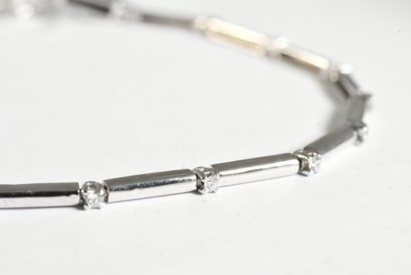 Bracciale tennis a barretta e diamanti