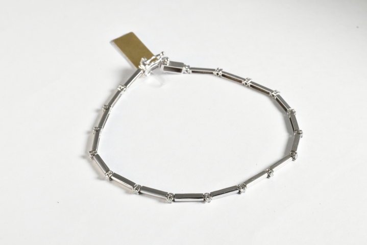 Bracciale tennis a barretta e diamanti