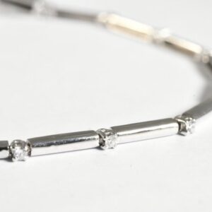 Bracciale tennis a barretta e diamanti